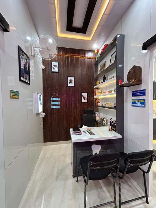Consultation desk and bookshelves at Cavity Critters Dental Studio
