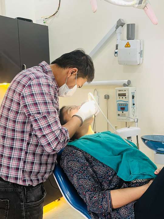 Gentle care for a young patient in the dental chair